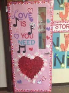 Love is all you need Valentines Day door decoration idea