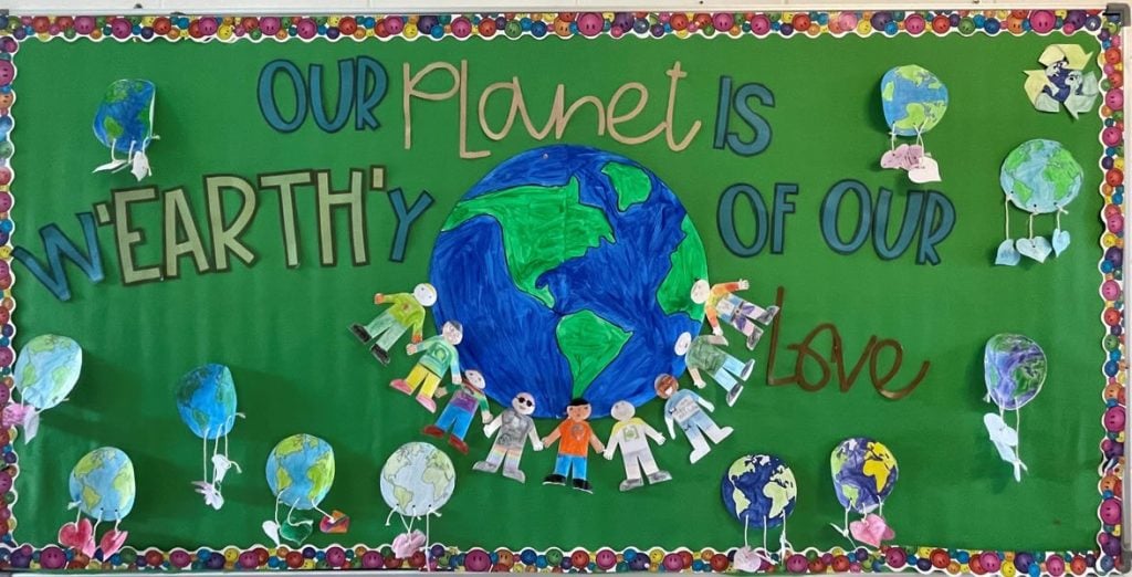 Our Planet Is W'Earth'y of Our Love Earth Day bulletin baord idea for second graders