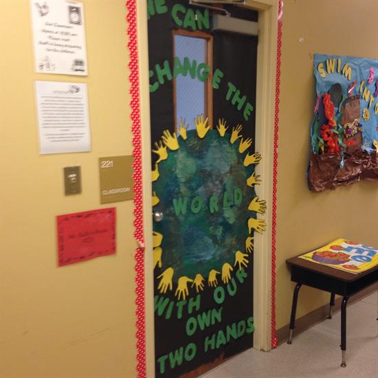 We Can Change The World With Our Two Hands Door Display Earth Day Bulletin Board Ideas